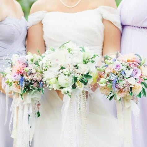 Soft pastel bouquets with ribbons and pearls
