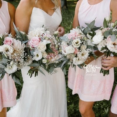 soft pink bridesmaids dresses with white and pink bouquets